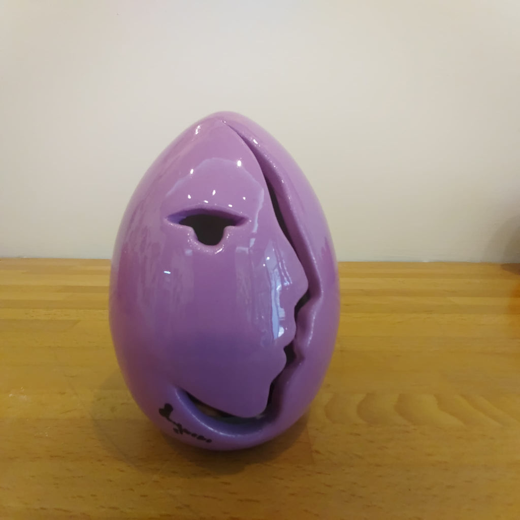 Uovo di Pasqua in ceramica con taglio profilo 13 cm