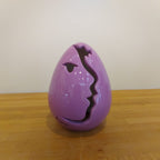 Uovo di Pasqua in ceramica con taglio profilo 17 cm