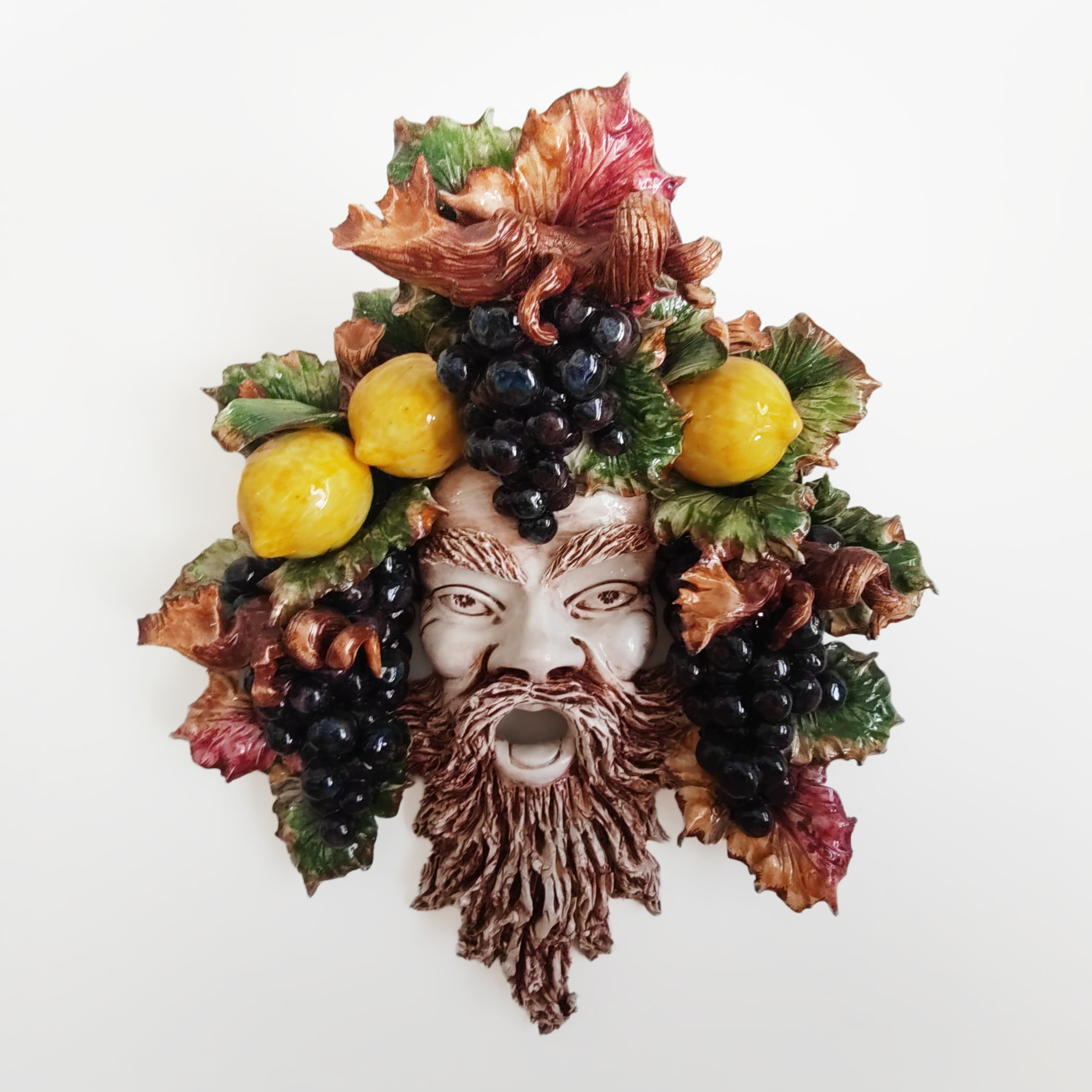 Mascherone di Bacco con uva e limoni in ceramica artigianale
