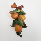 Applique in ceramica con frutta