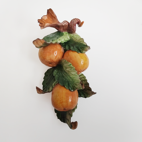Applique in ceramica con frutta